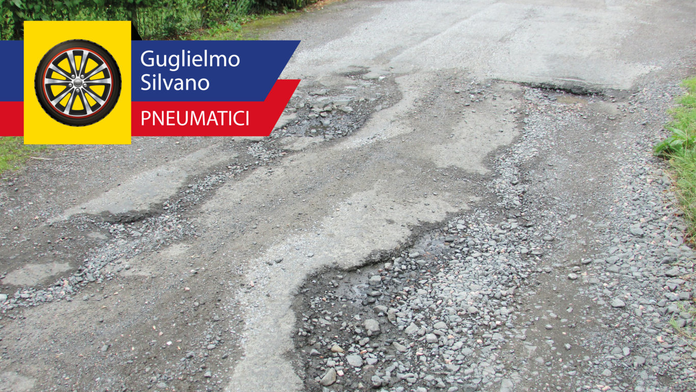 maltempo buche asfalto sconnesso